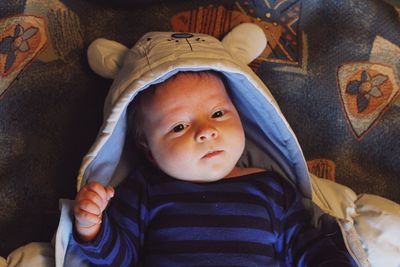 Portrait of cute baby girl at home