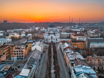 High angle view of city buildings during sunset