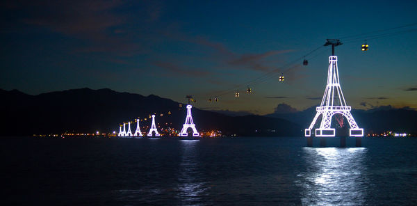 Scenic view of sea against sky at night