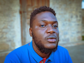 Portrait of young man looking away