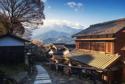 Houses and buildings against sky