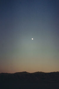 Scenic view of moon in sky at night