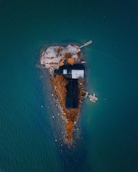 High angle view of traditional building by sea