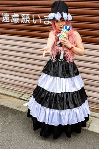 High angle view of girl holding umbrella