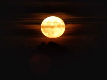 View of moon at sunset