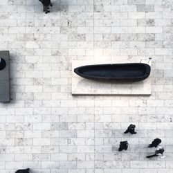 Men standing against wall