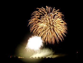 Low angle view of firework display