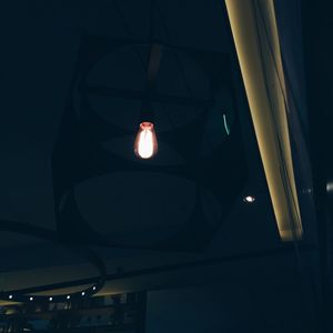 Low angle view of illuminated lamp