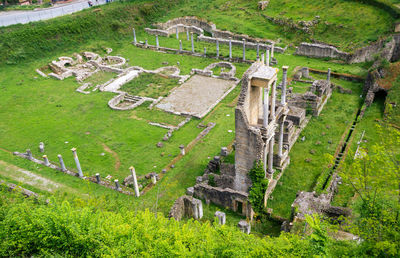 Remains or ruins of ancient roman amphitheatre in volterra, pisa, tuscany, italy