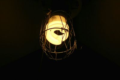 Low angle view of illuminated lamp