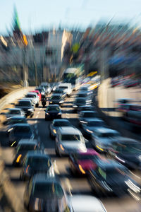 Blurred motion of cars on road in city