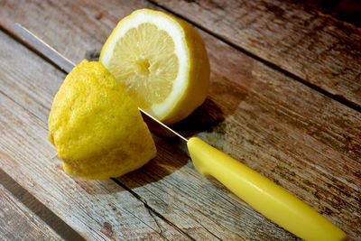 High angle view of lemon slice on cutting board