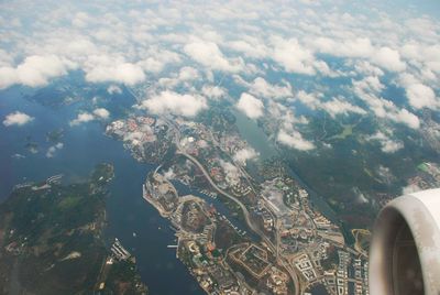 High angle view of cityscape seen through airplane window