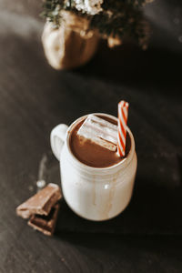 Close-up of coffee cup on table