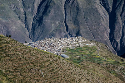 High angle view of rocks on land against mountains