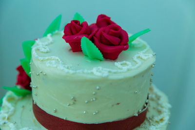 Close-up of cake against blue background