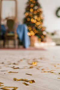 Unfocused classic christmas interior with new year tree decorated.