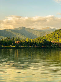 Scenic view of lake against sky during sunset