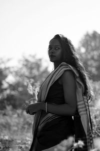 Young black woman looking at camera