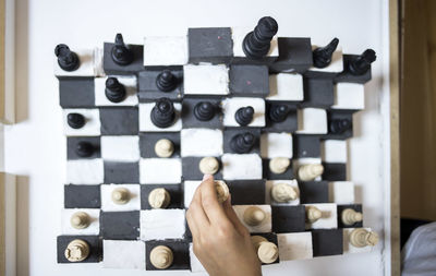 High angle view of man playing on table