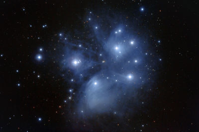 Fireworks against star field at night