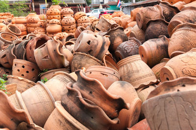 Close-up of earthenware for sale at market stall