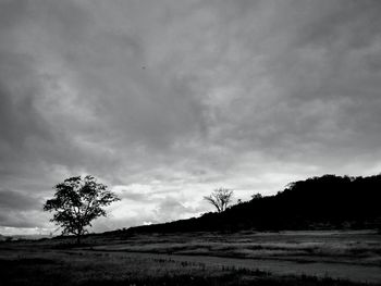 View of landscape against cloudy sky