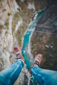 Low section of man over river