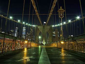 Illuminated footbridge at night