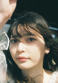 Close-up portrait of a beautiful young woman