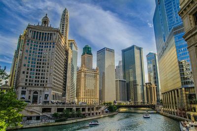 Low angle view of skyscrapers against sky