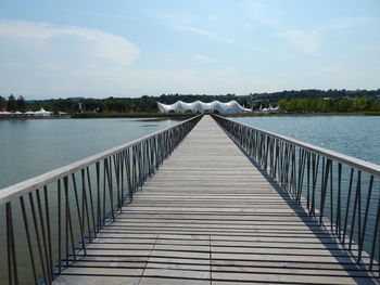 Bridge over river against sky