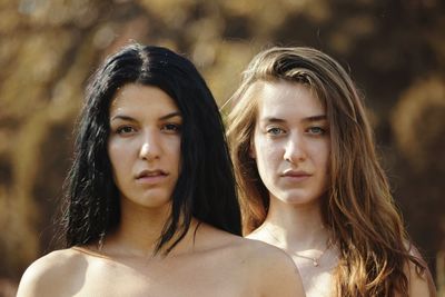 Portrait of beautiful young women standing outdoors