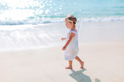 Full length of woman on beach