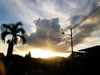 Silhouette of houses at sunset