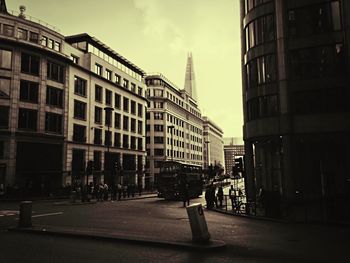 Buildings in city against sky