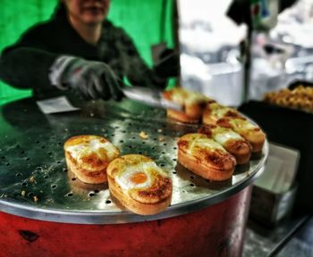 Close-up of man preparing food