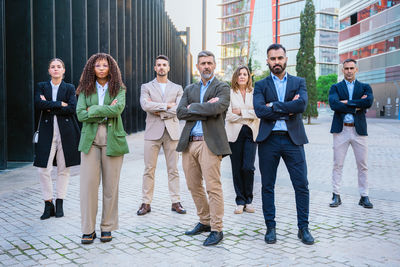 Business colleagues standing on street