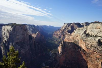 Panoramic view of rocky mountains against sky