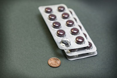 Close-up of coins on table