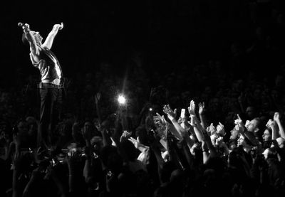 Crowd at music concert at night