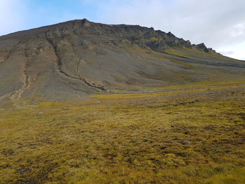 Scenic view of mountain range against sky