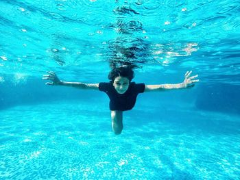 Woman swimming in sea