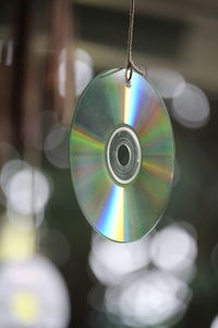 Close-up of lighting equipment hanging on ceiling