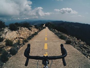 Road leading towards mountains