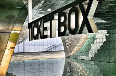 Reflection of building on swimming pool