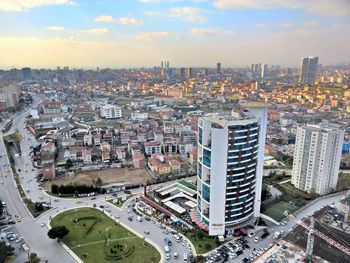 High angle view of buildings in city against sky