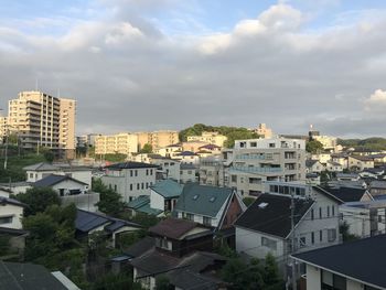 High angle view of buildings against sky