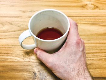 High angle view of coffee cup on table