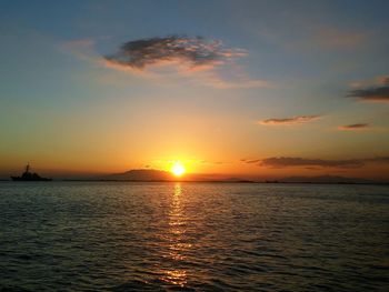 Scenic view of sea at sunset